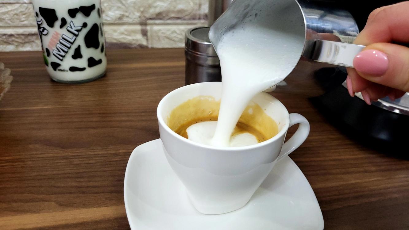 Pouring Steamed Milk 