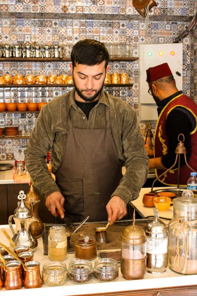 A Barista Brewing Turkish Coffee