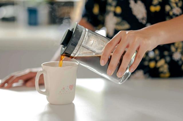 Pouring Coffee from French Press