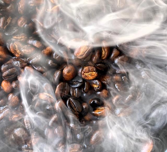 Dark Roasted Coffee Beans with an Oily and Smoky Flavor