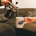 Pouring French press coffee to a Guest
