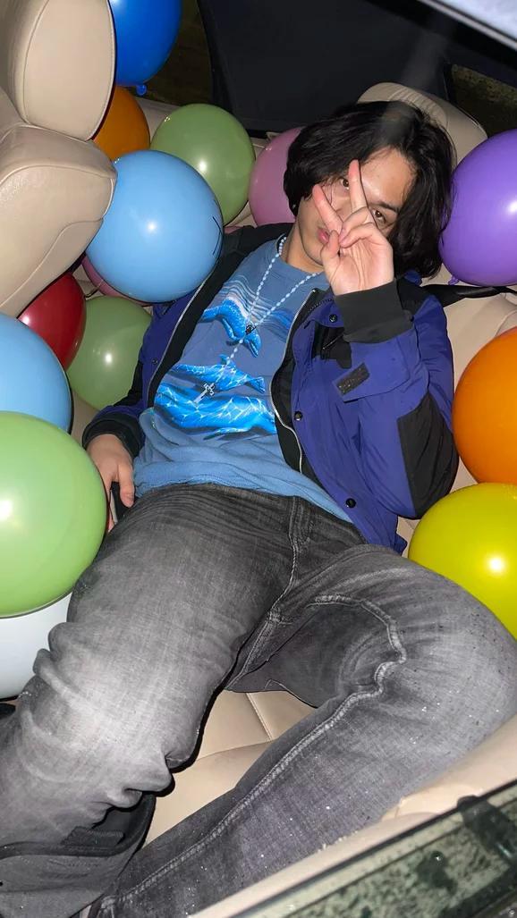 Feng with balloons