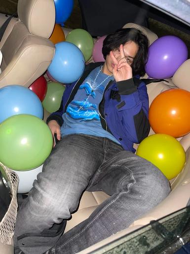 Feng with balloons