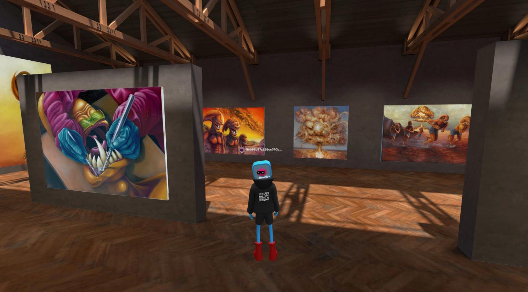 a person is standing in a room with paintings on the wall .