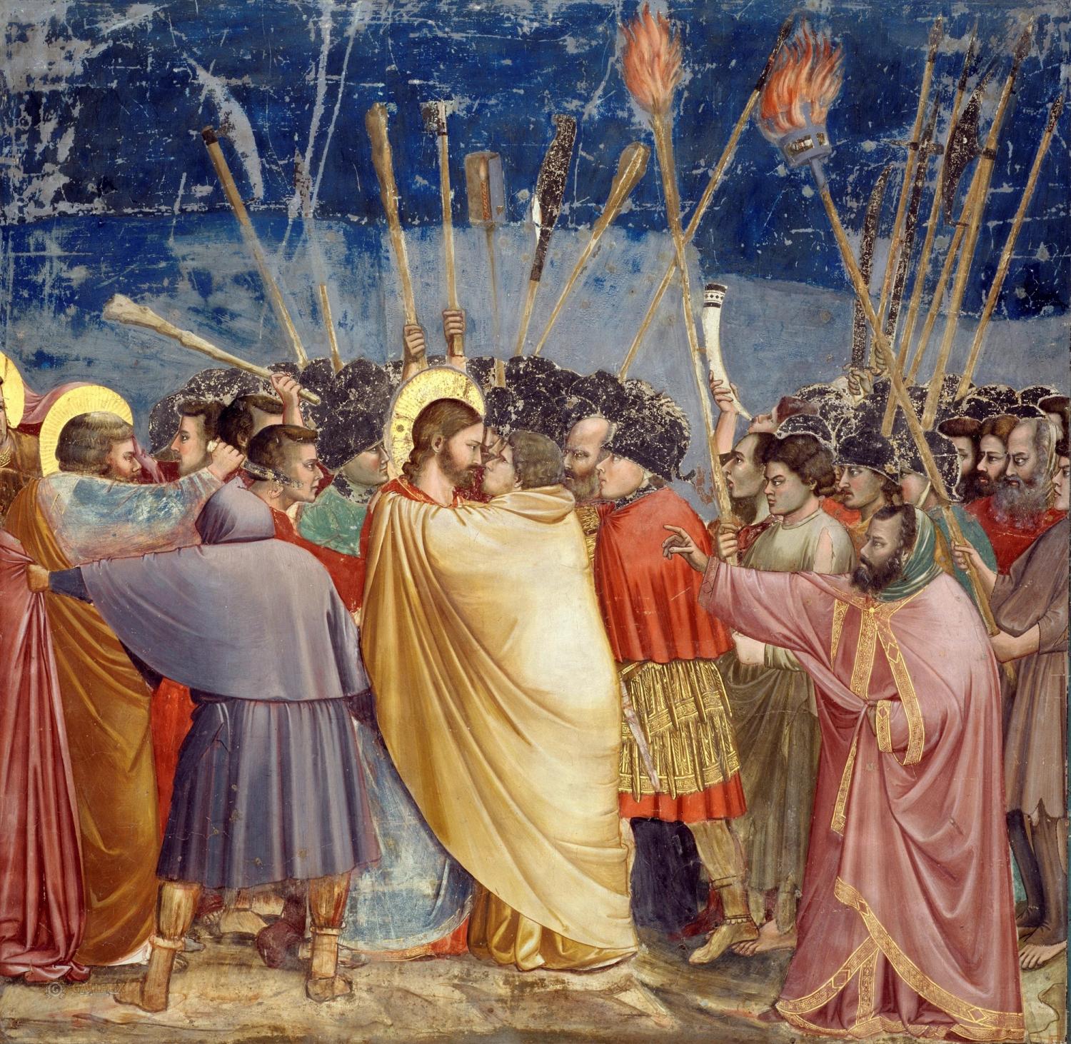 a painting of jesus being kissed by a group of people holding sticks .