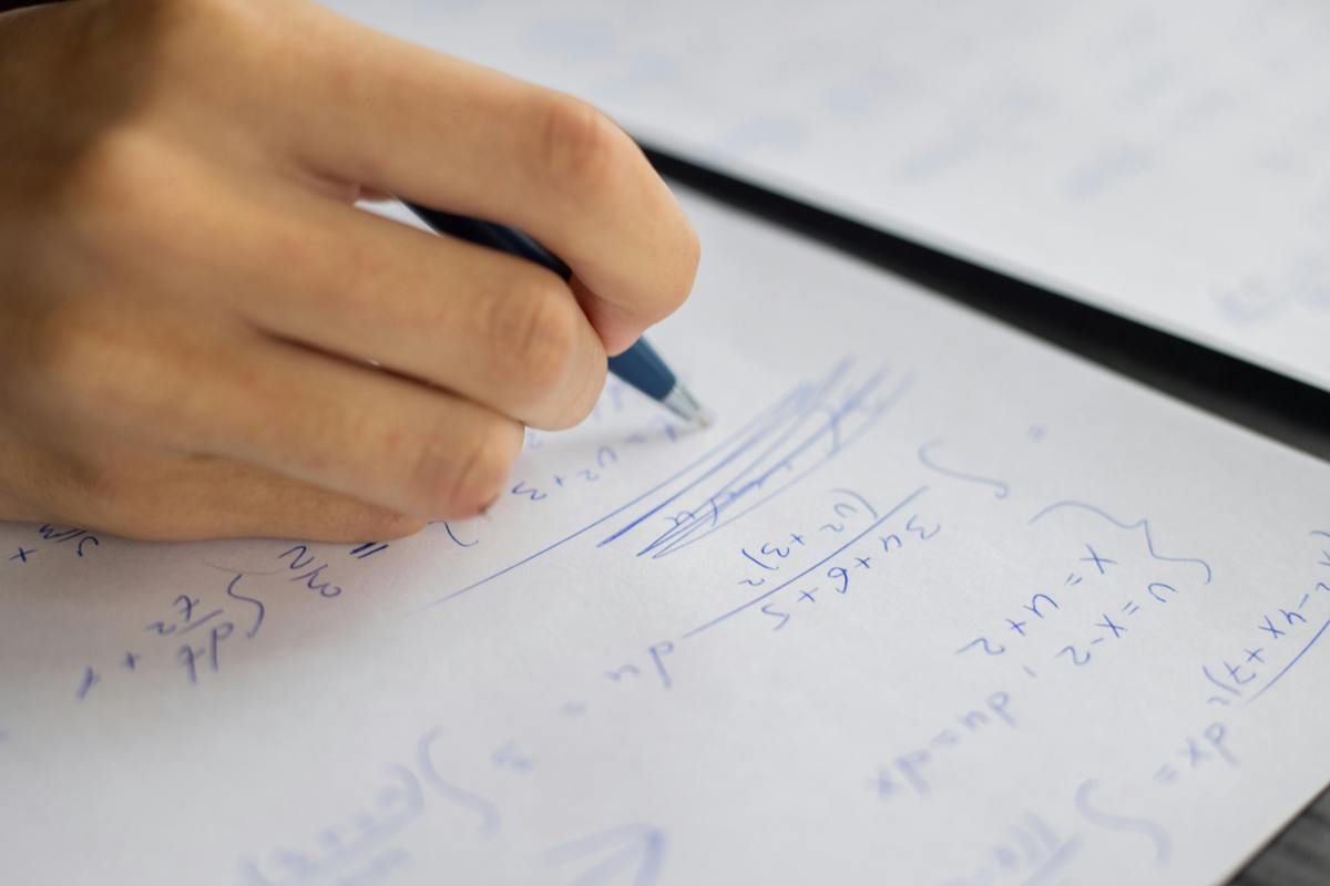 student working on SAT math question