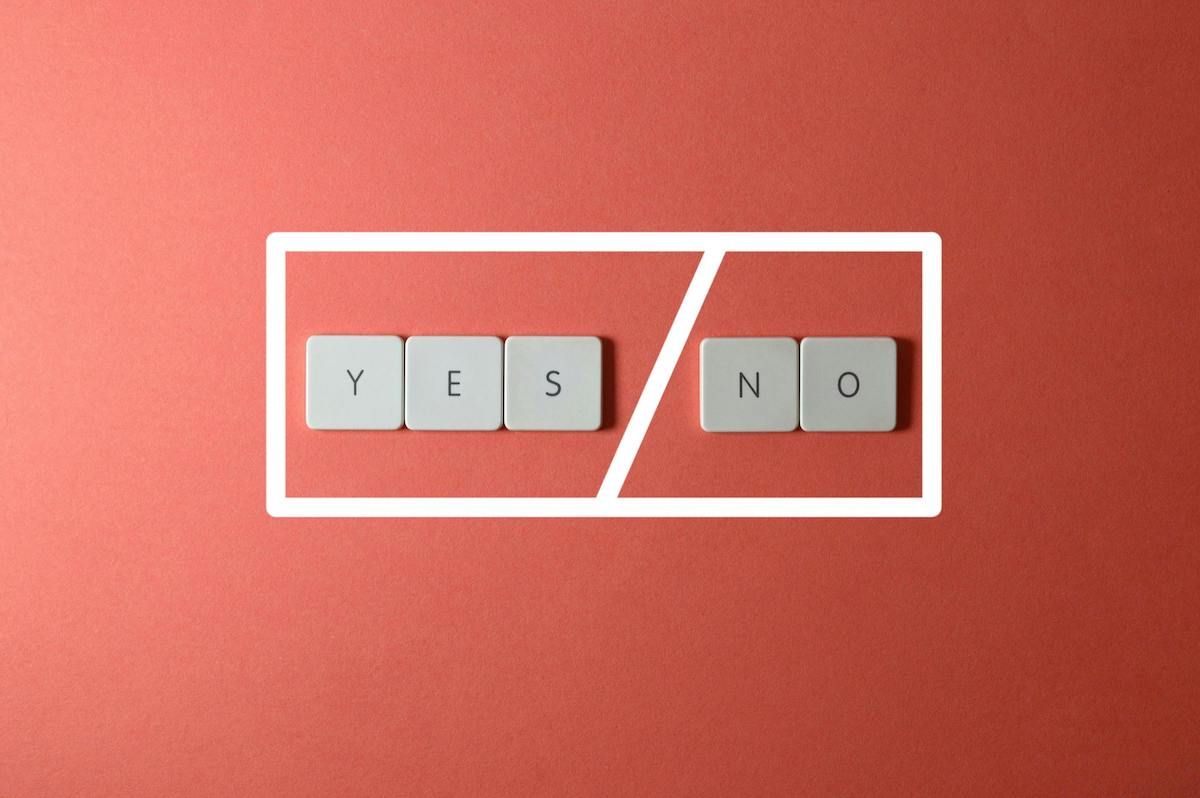 Tiles symbolizing yes or no in admissions 