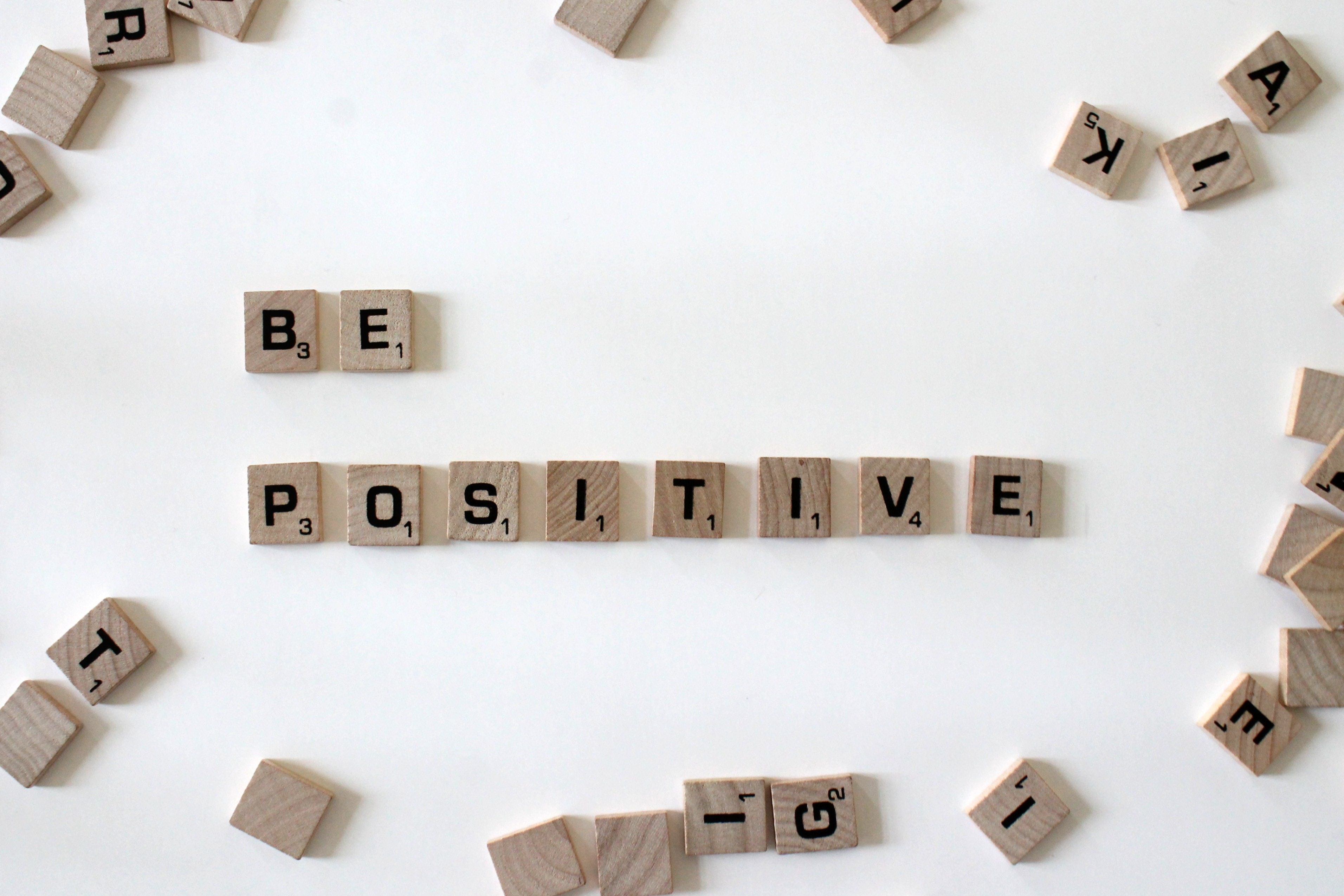 Letter blocks saying “Be positive” 