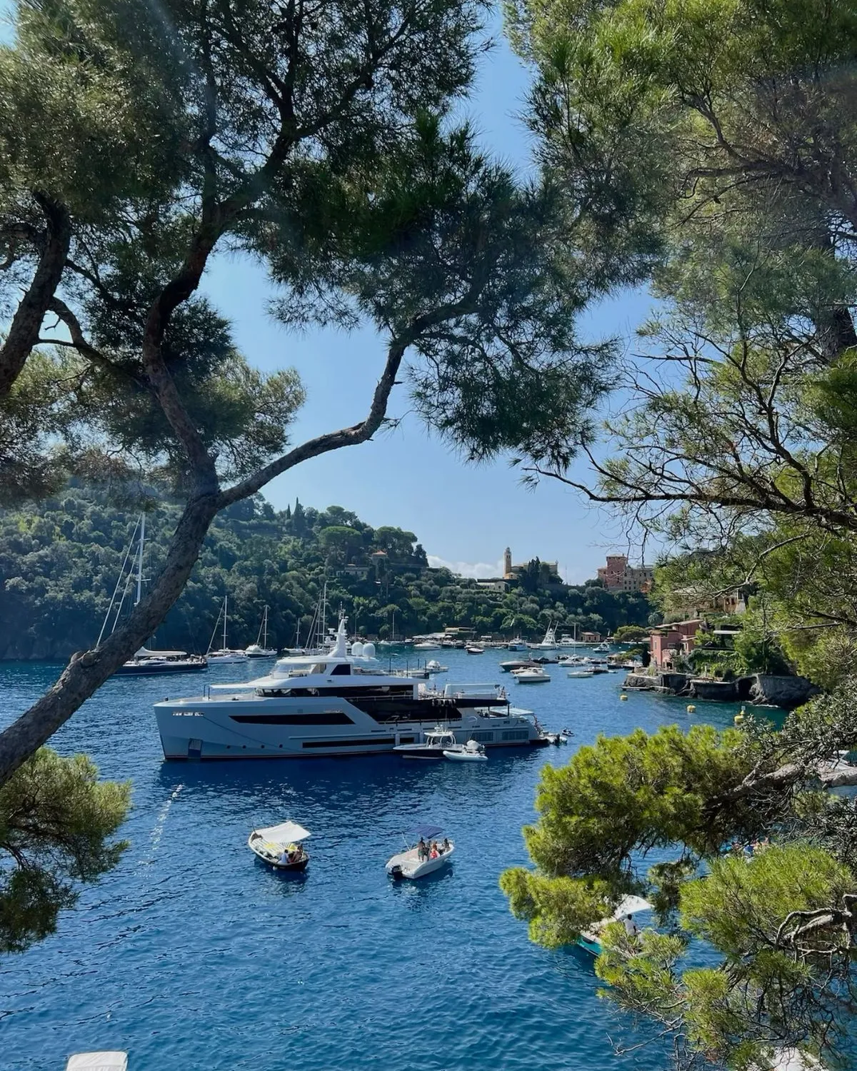 Yachts anchored along the Italian Riviera coastline