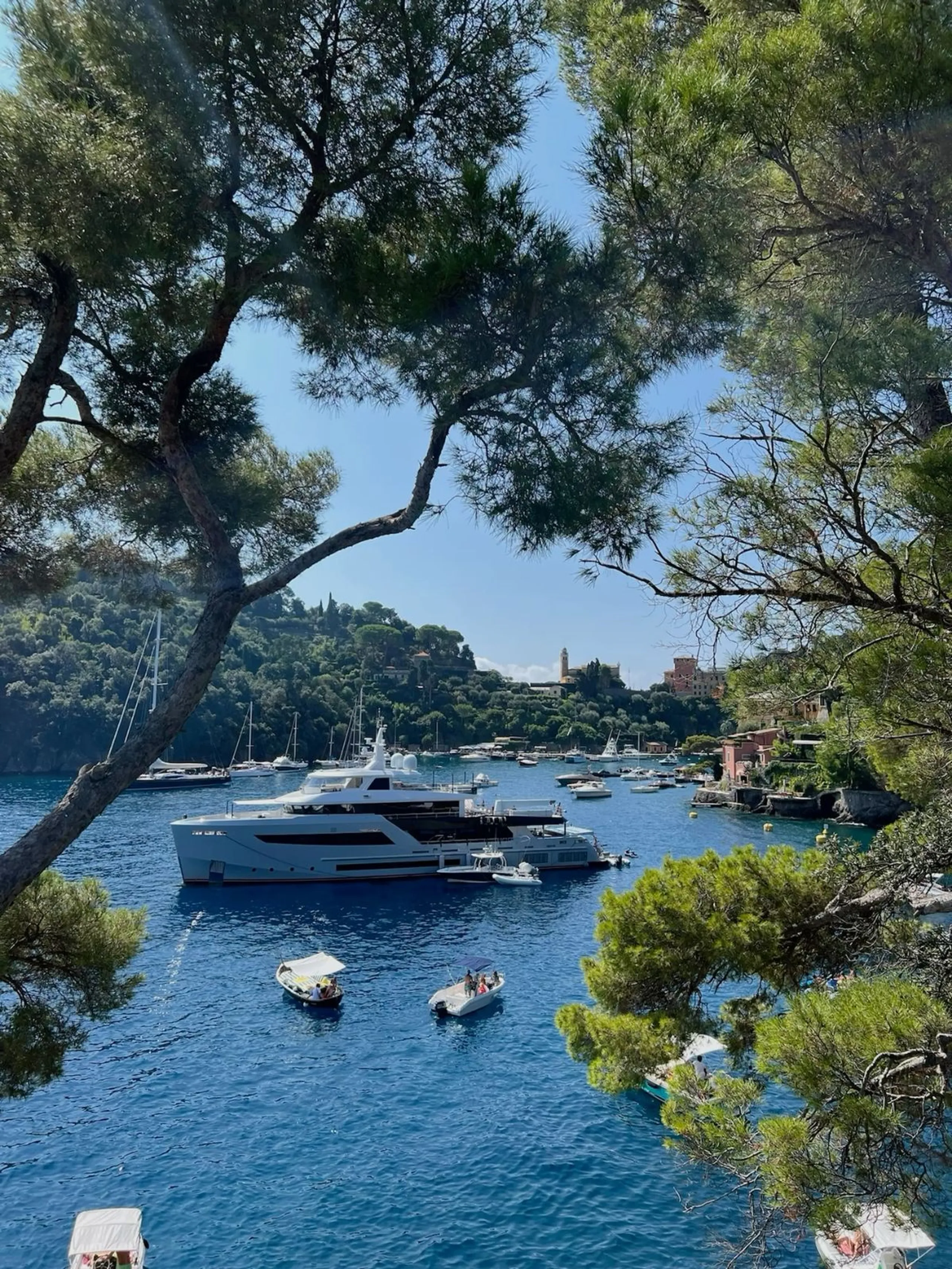 Yachts anchored along the Italian Riviera coastline
