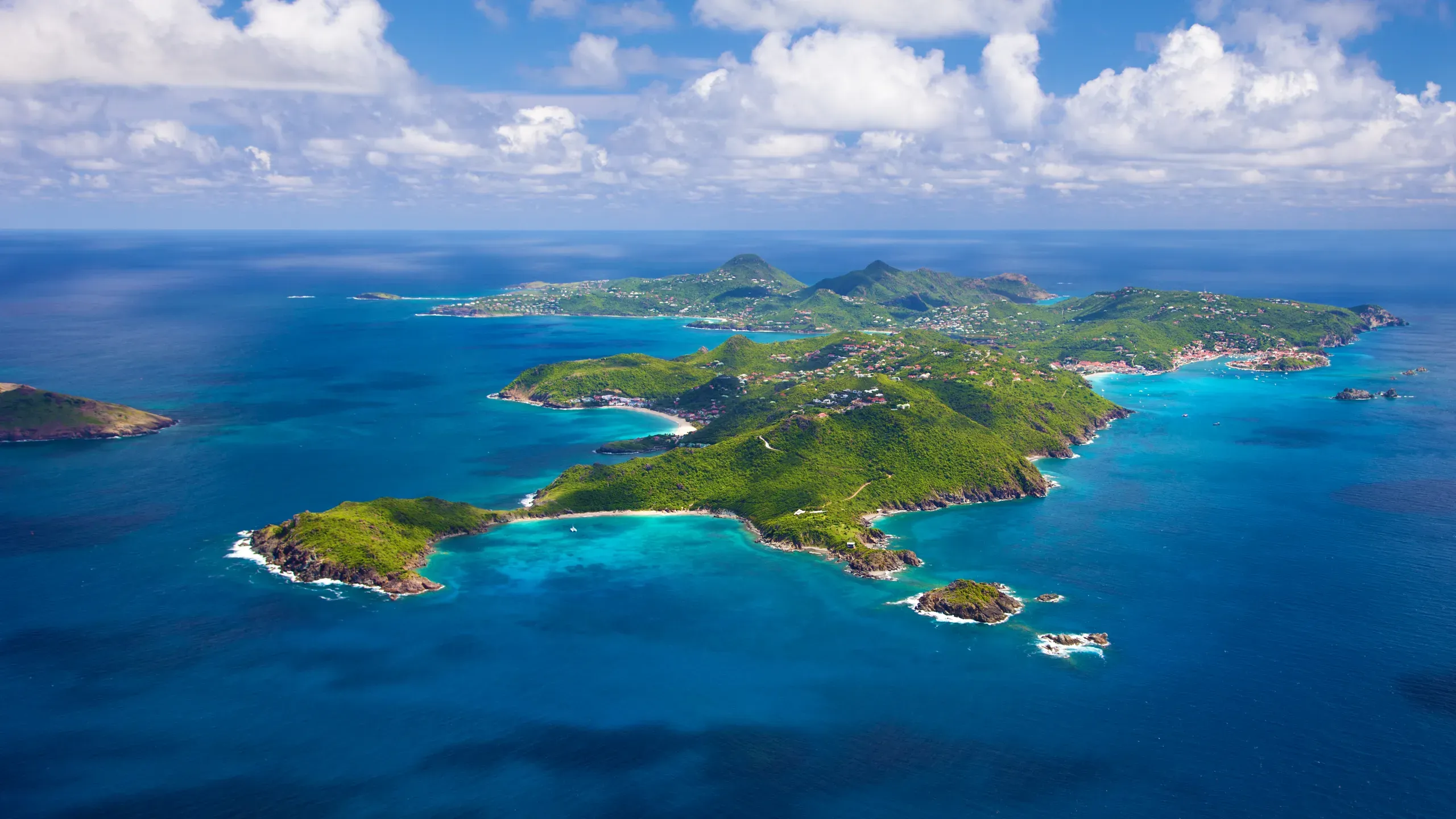 Aerial view of St Barths island with turquoise bays and surrounding Caribbean waters