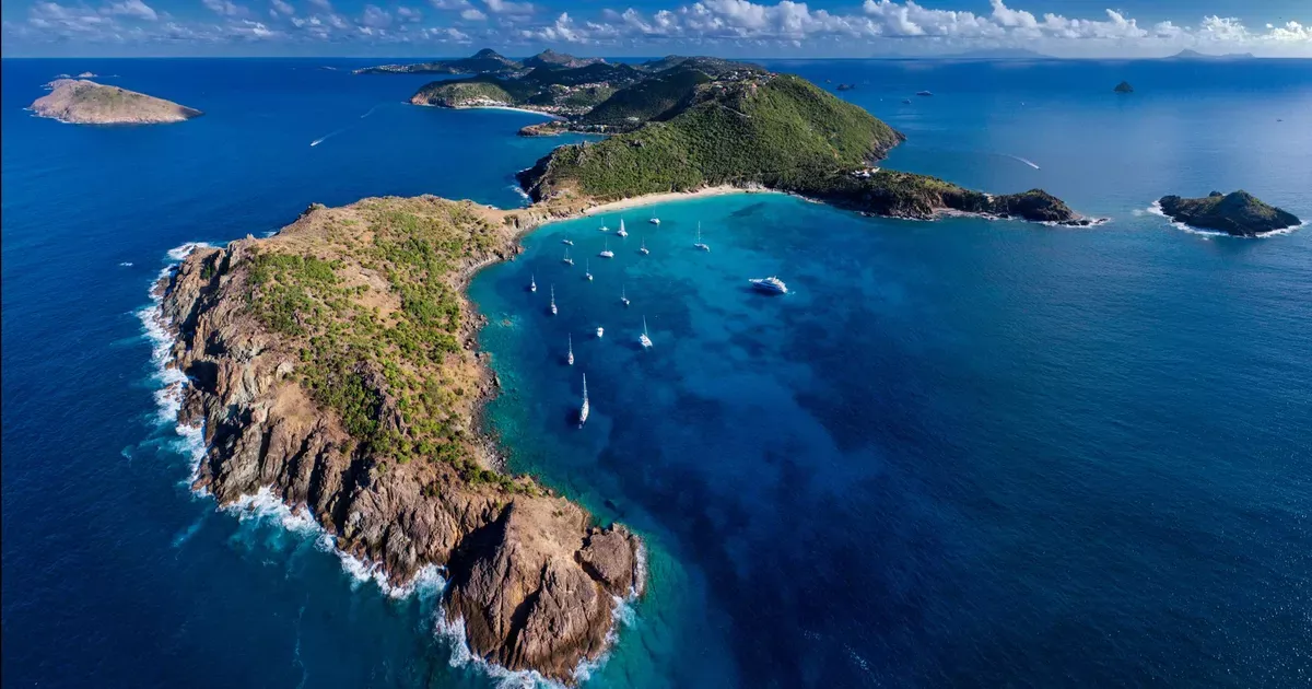 Yachts anchored in a sheltered bay in St Barths
