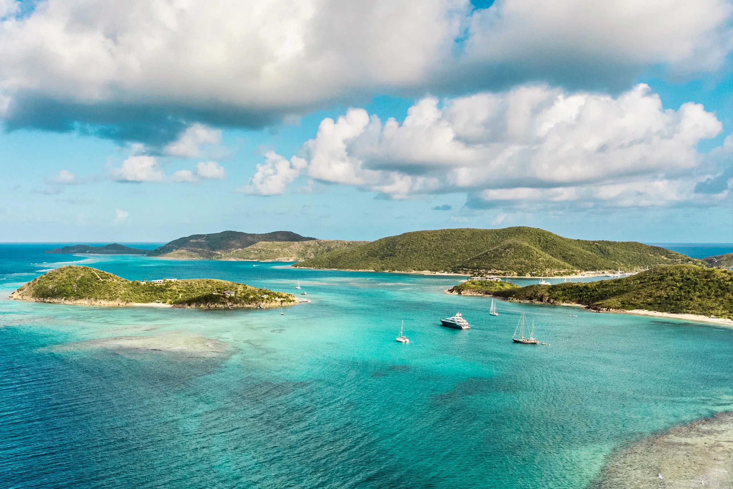 British Virgin Islands yacht charter with yachts anchored between tropical islands