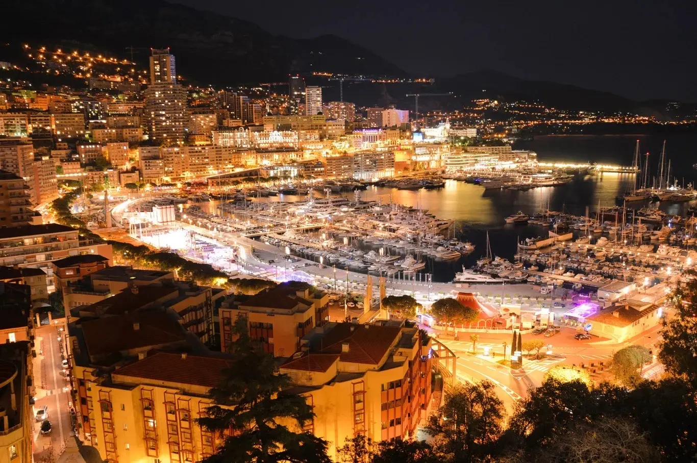 The Monte Carlo seafront seen from the bay at dusk