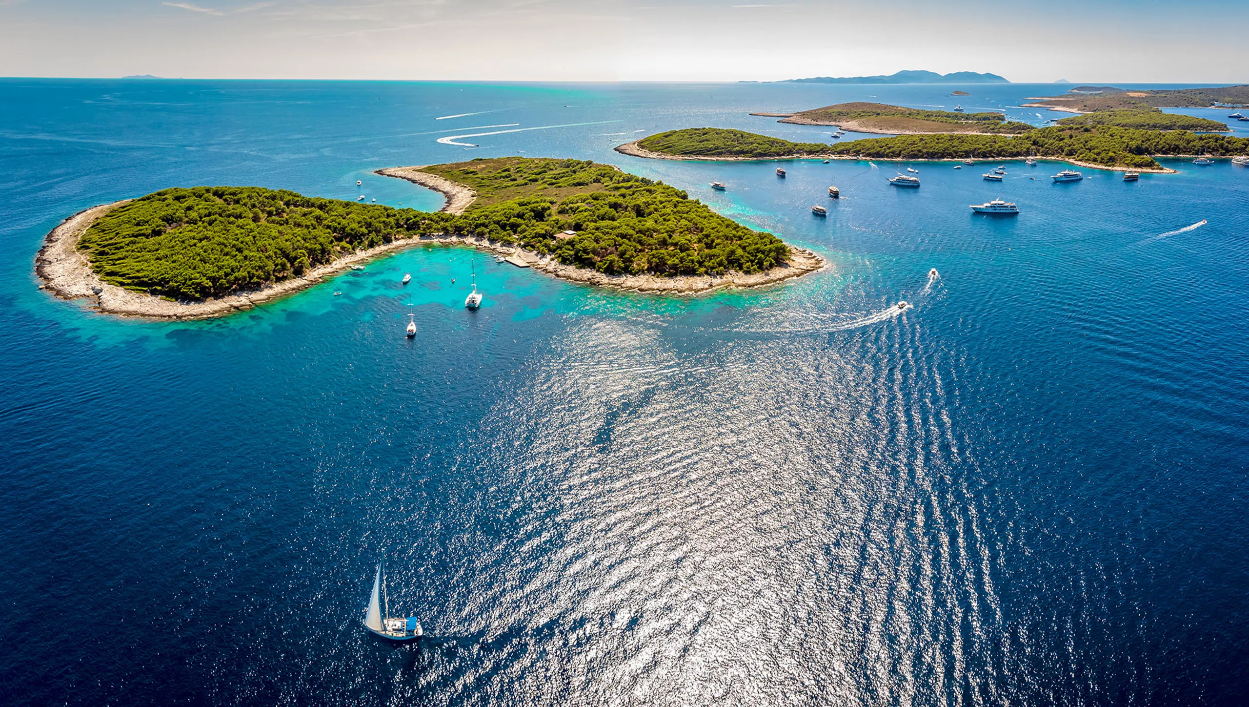 Aerial view of yachts cruising around the islands near Hvar in Croatia