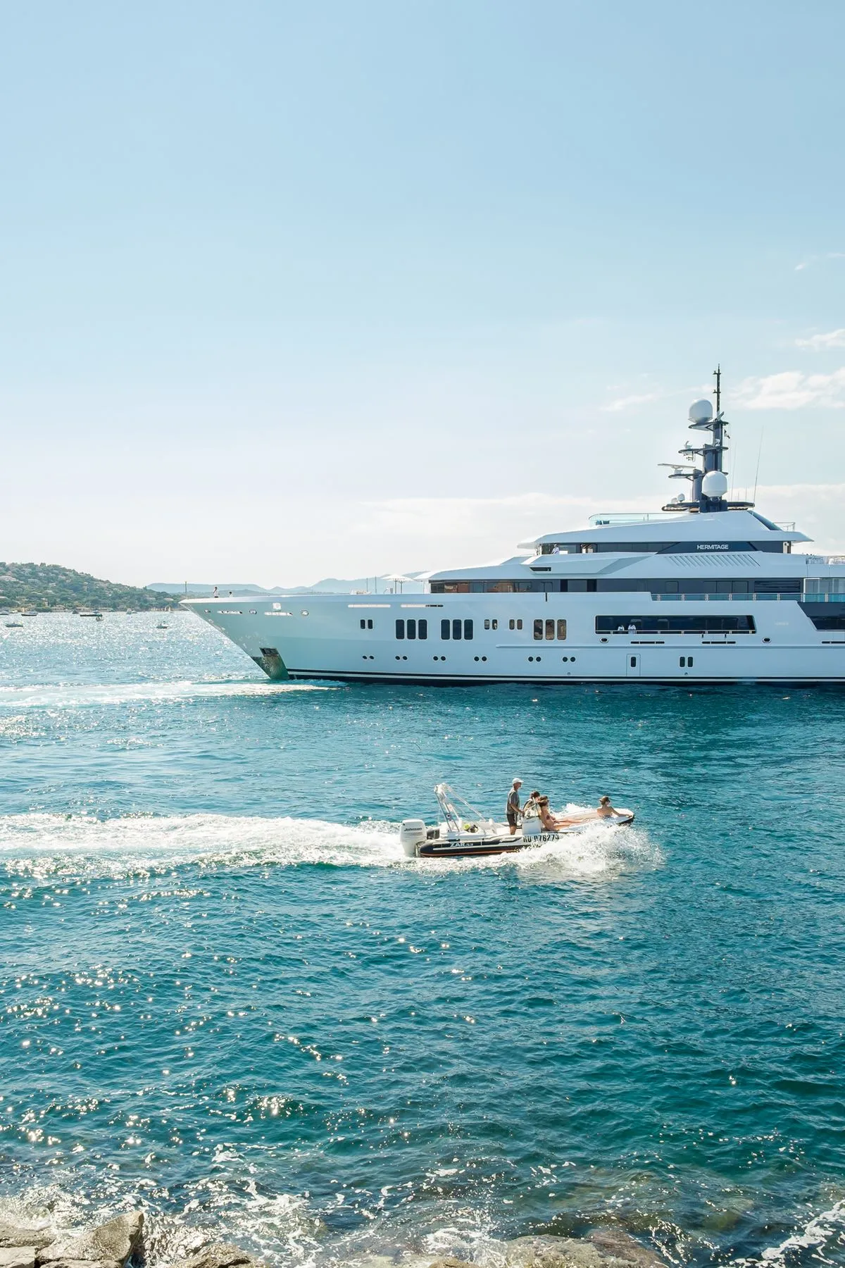 Superyacht cruising with tender support during a Mediterranean charter