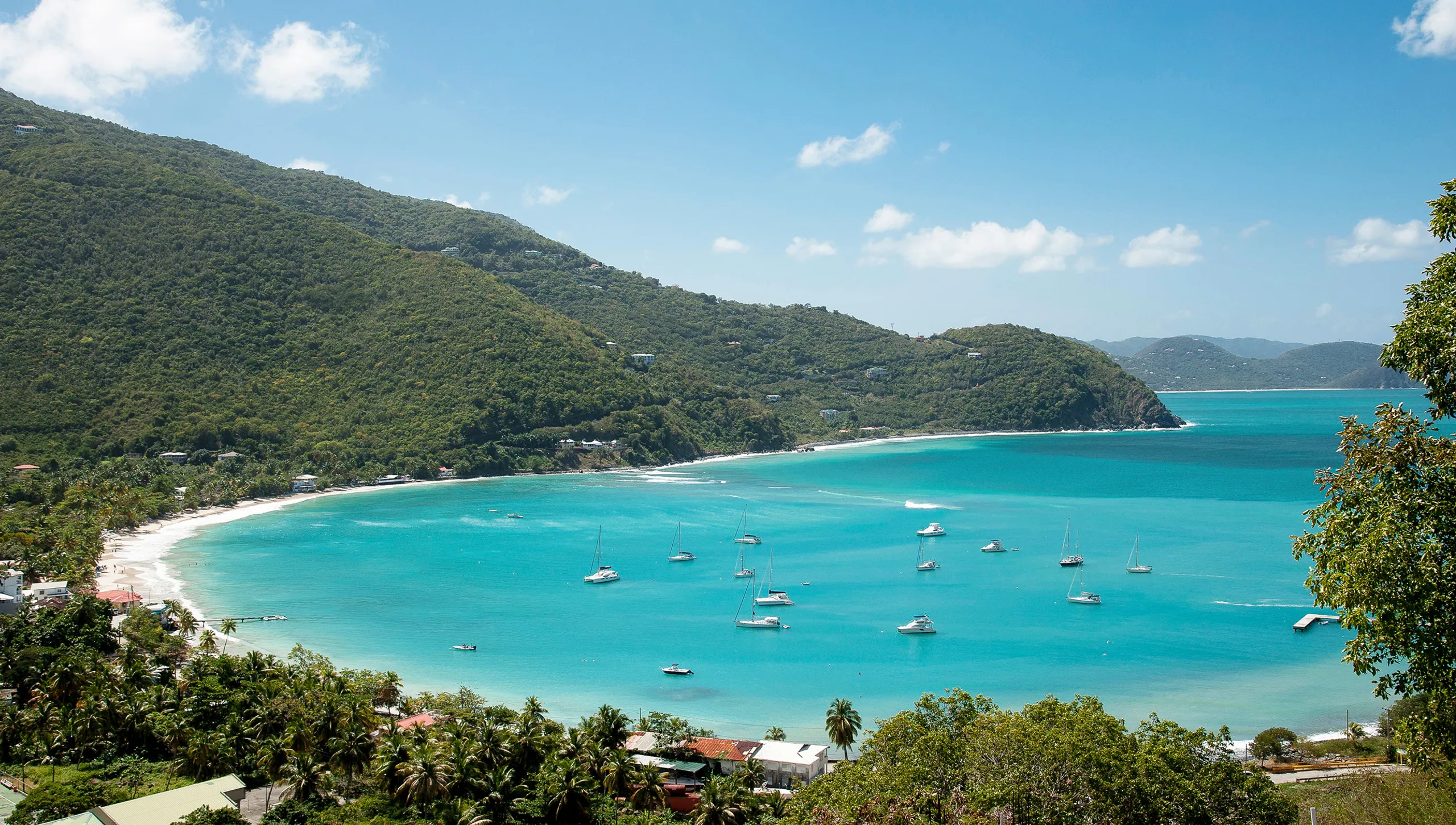 Yachts anchored in a turquoise bay in the British Virgin Islands