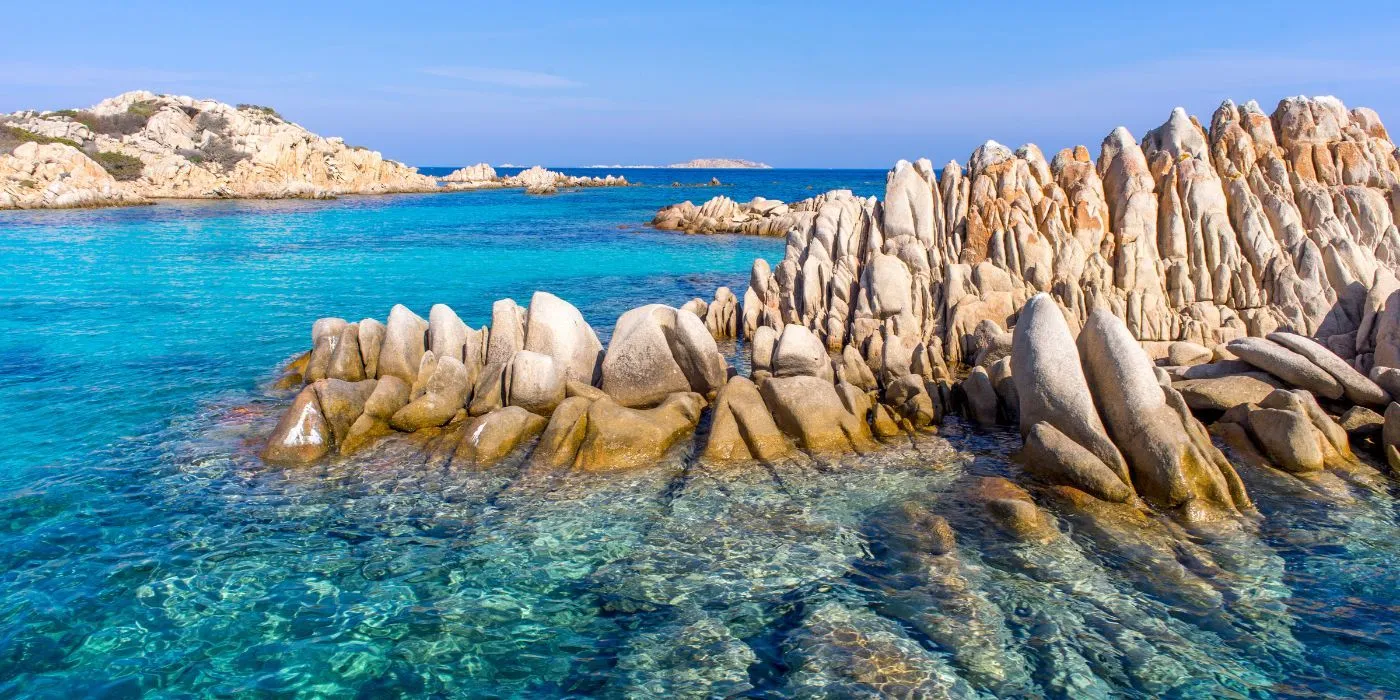 Turquoise waters and granite rock formations along the Costa Smeralda in Sardinia