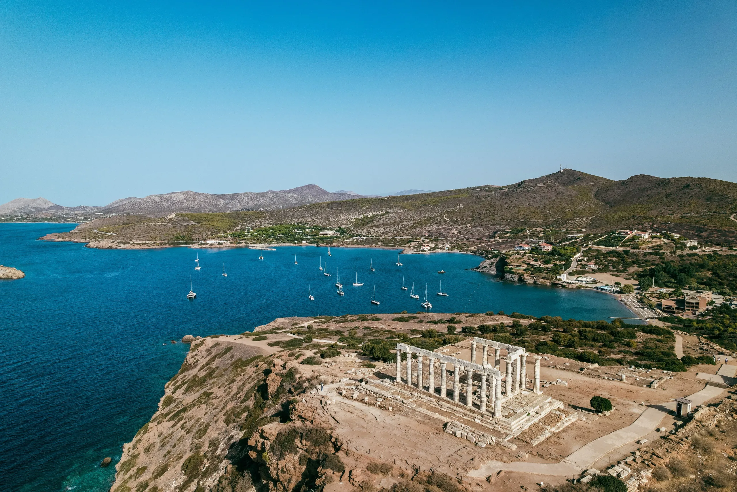Athens Riviera coastline with yachts and turquoise water near the Greek islands