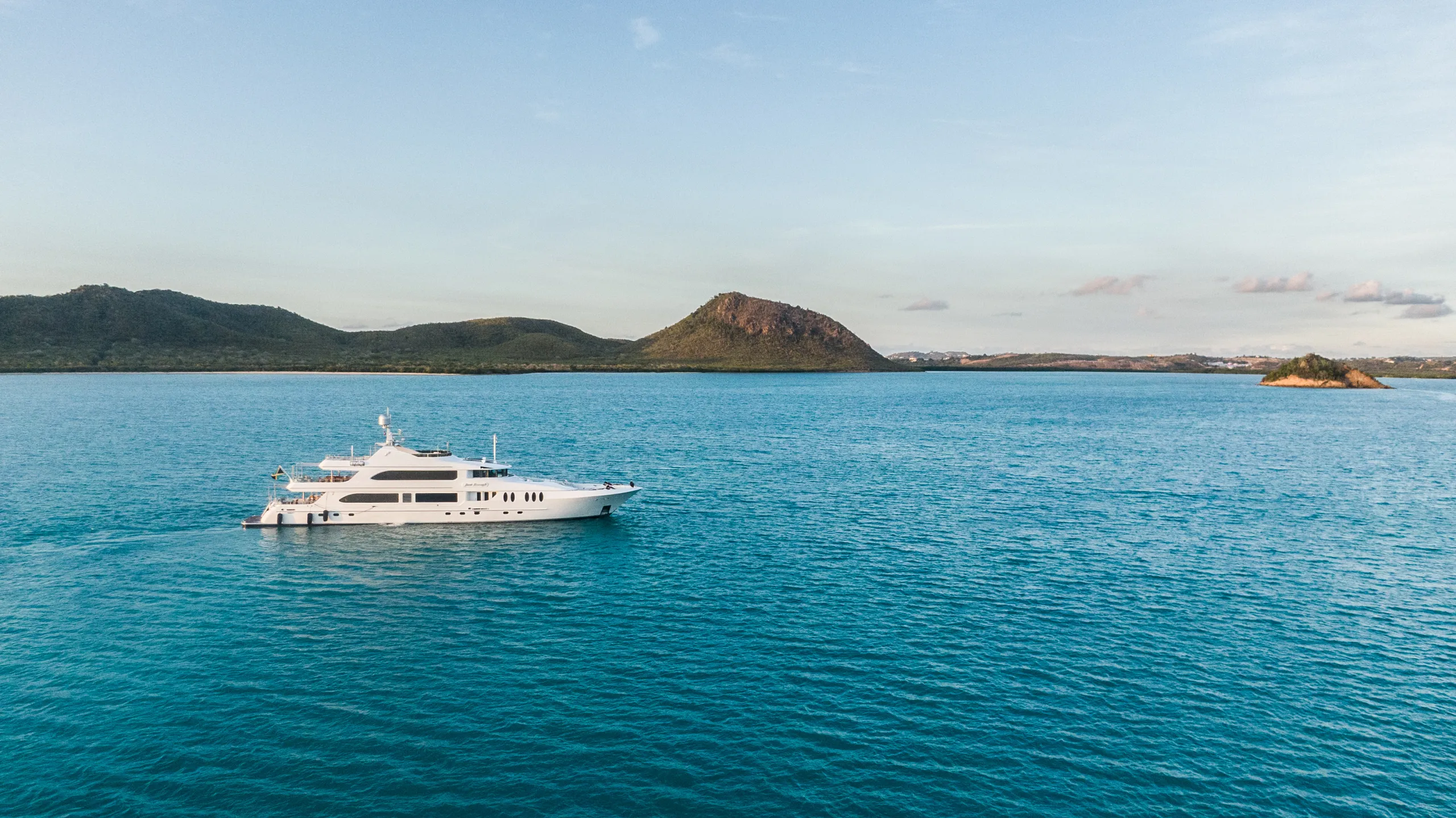 Antigua yacht charter bay with luxury yachts and turquoise water