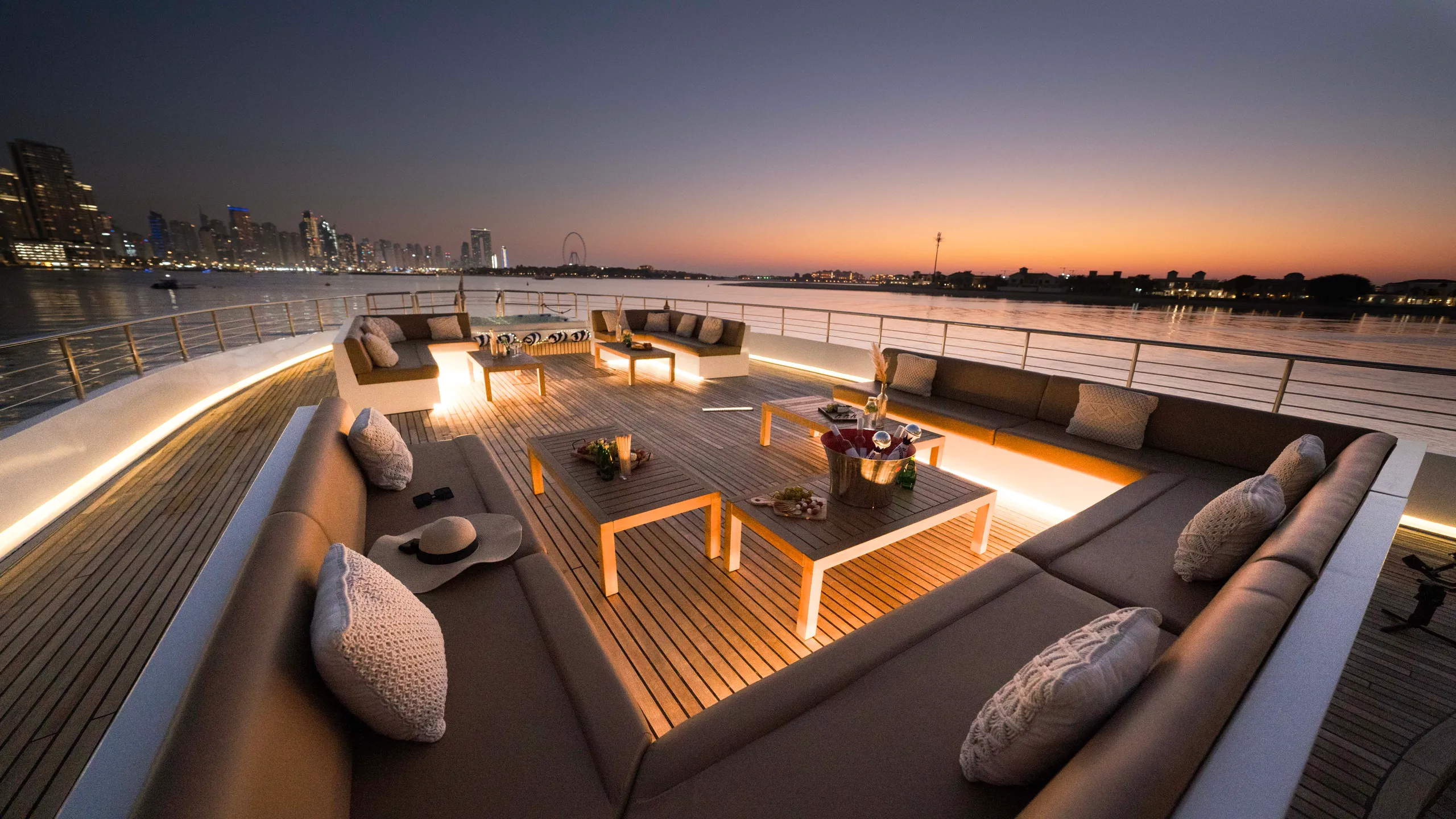 Luxury yacht event setting at sunset in Dubai Marina