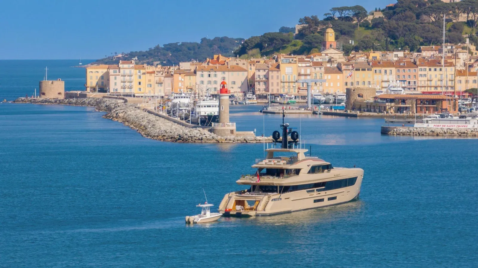 Motor yacht cruising off Saint-Tropez on a sunny day