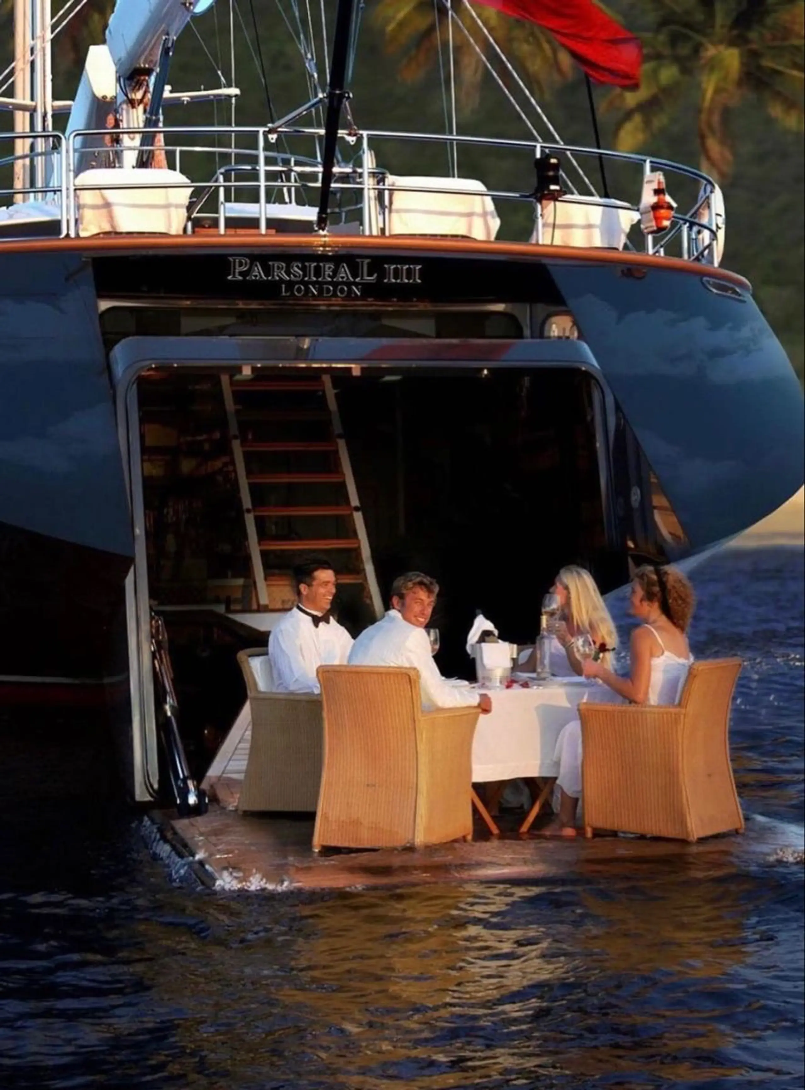 A tender approaching the Monaco shoreline at the end of the day