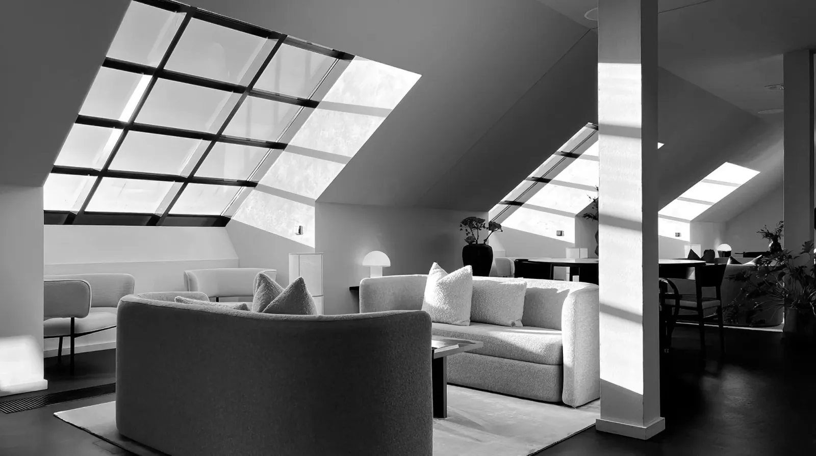 The Kenza office — workspace under a glass roof