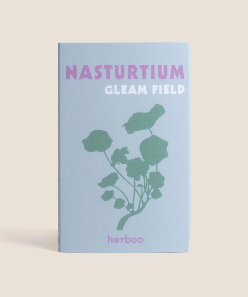 Herboo Tropaeolum majus ‘Gleam Fields’ seed packet showing bright trailing nasturtium illustration with edible leaves and flowers.