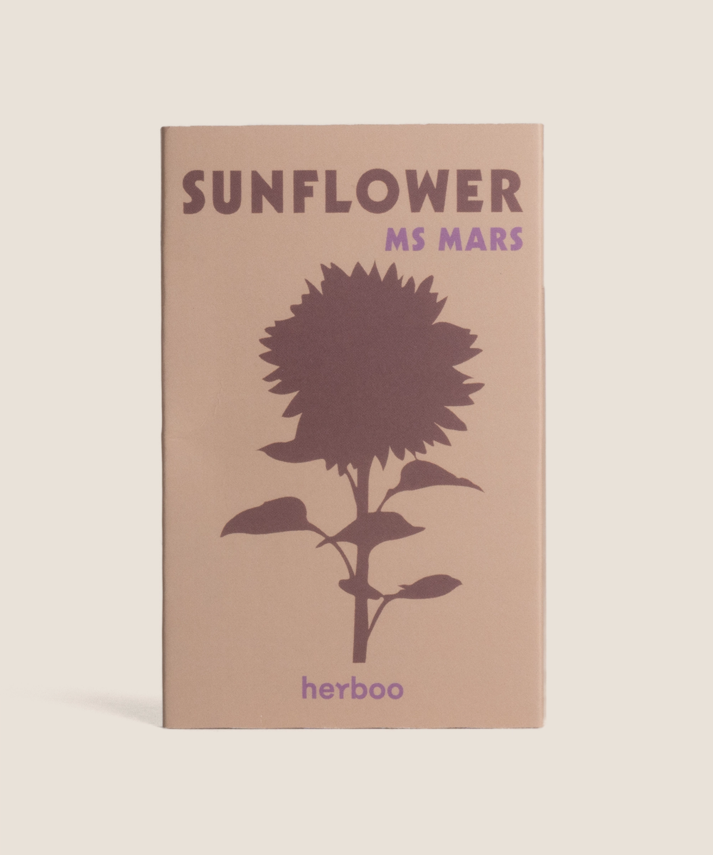 Sunflower ‘Ms Mars’ seed packet showing illustrated pink and yellow Helianthus annuus blooms on a clean background