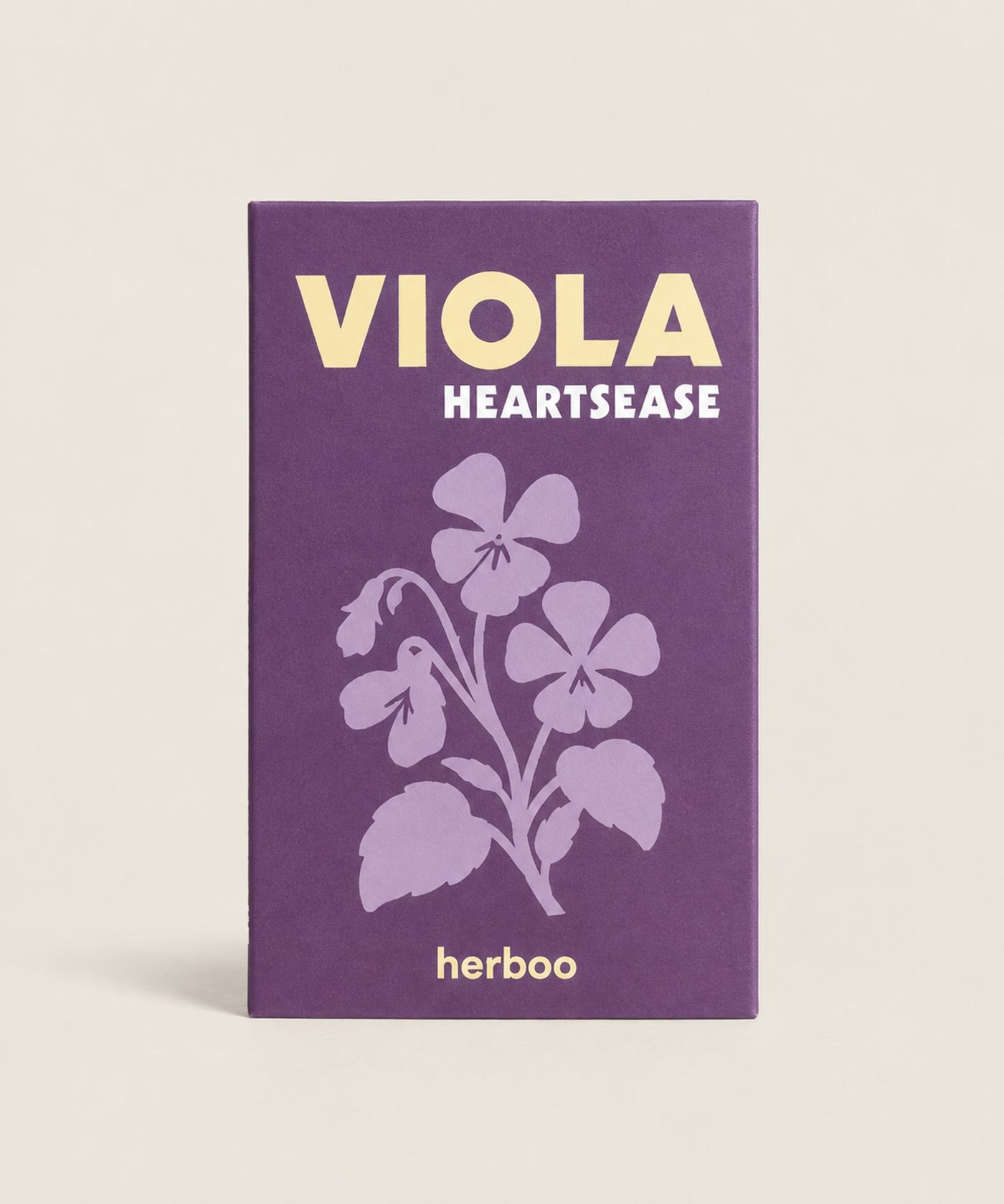 Viola Heartsease Seed Packet against a beige background