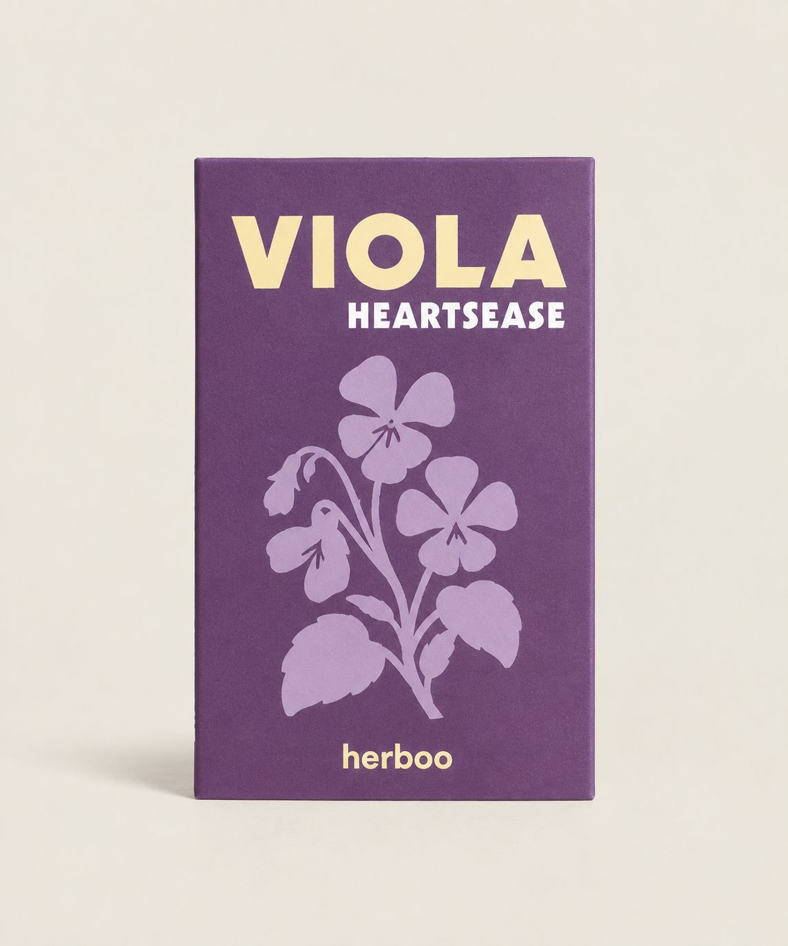 Viola Heartsease Seed Packet against a beige background