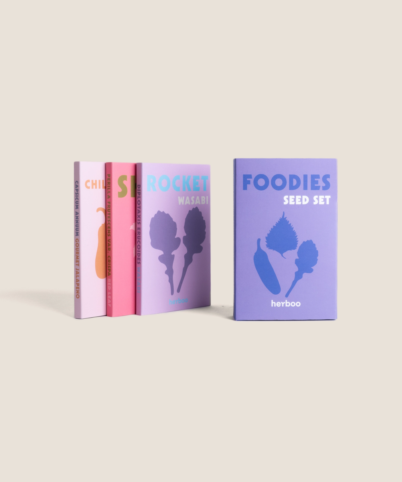 Herboo Foodies Seed Set with all packets displayed together, showing vibrant illustrations for culinary herb and spice varieties.