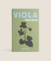Herboo Viola ‘Freckles’ seed packet with white and blue-speckled flower illustration on a plain background