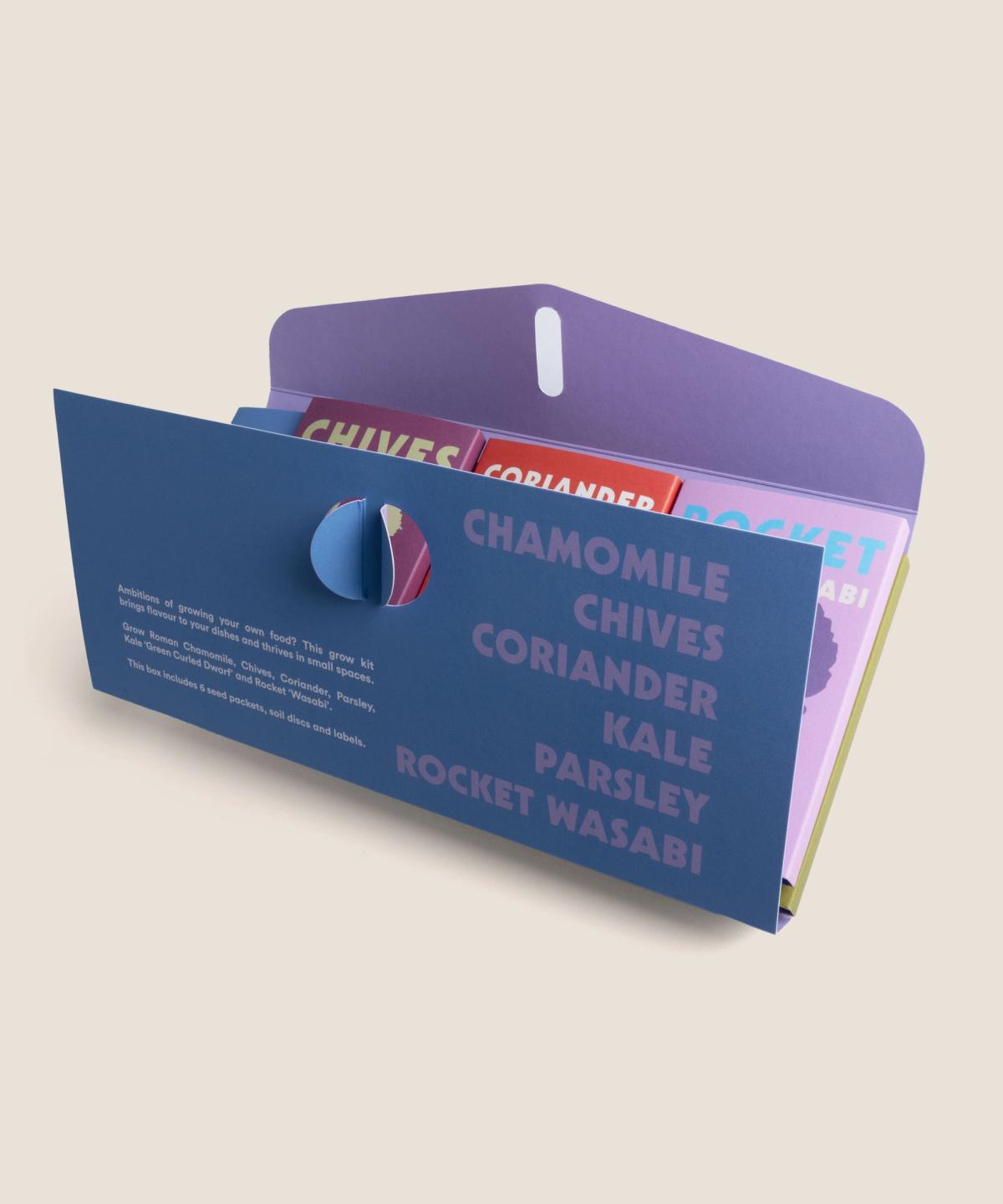 Kitchen Garden Seed Box opened with herb seeds and soil discs