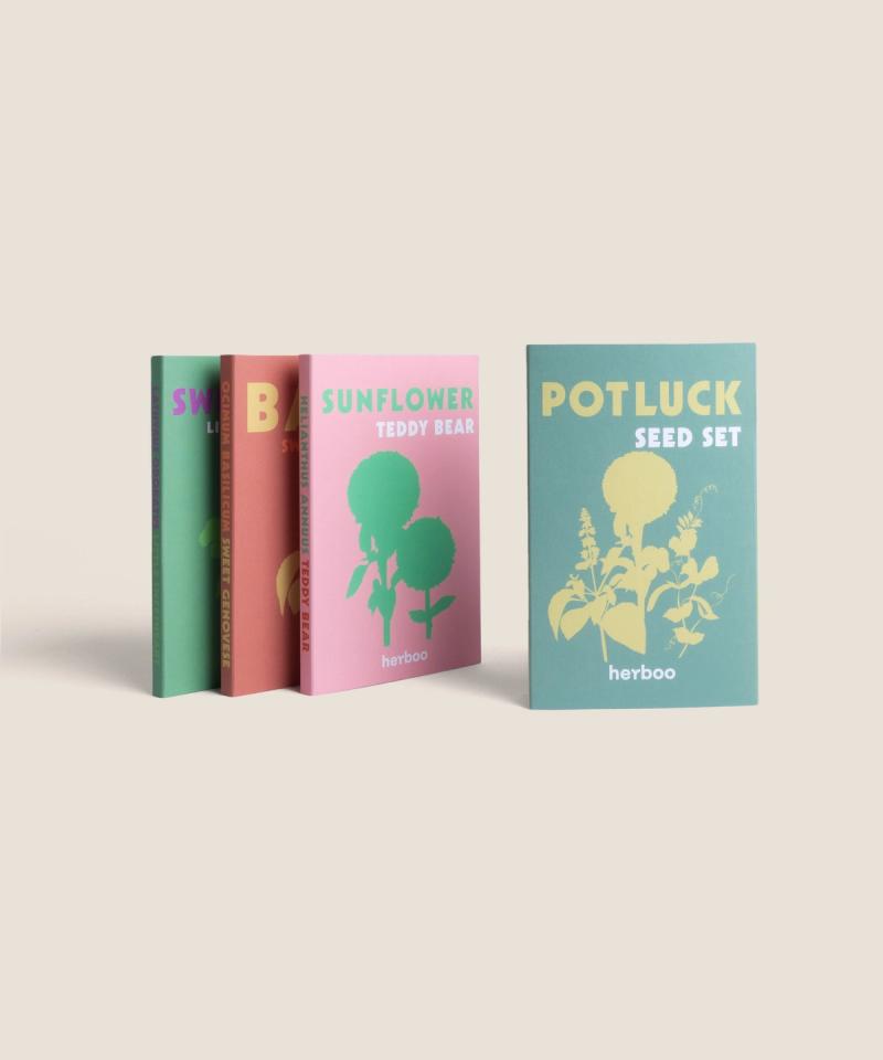 Herboo Pot Luck Seed Set packet featuring assorted botanical illustrations of mixed flower and herb varieties.