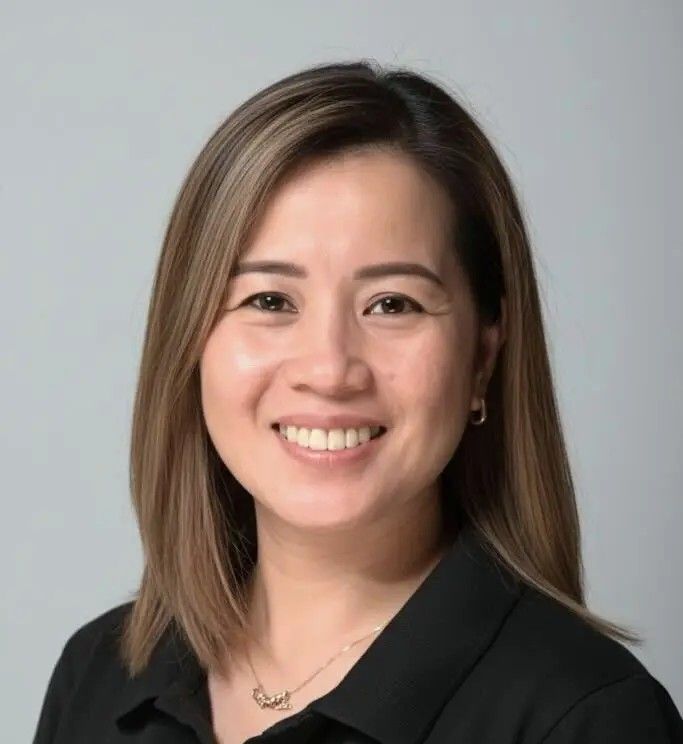 Headshot of Joy Munoz, Office Manager