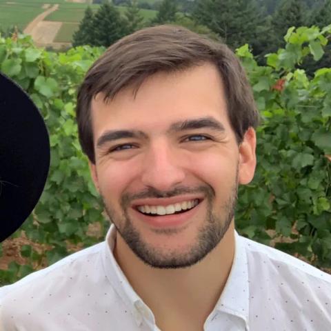 Headshot of Logan Miller, Paid Media Manager