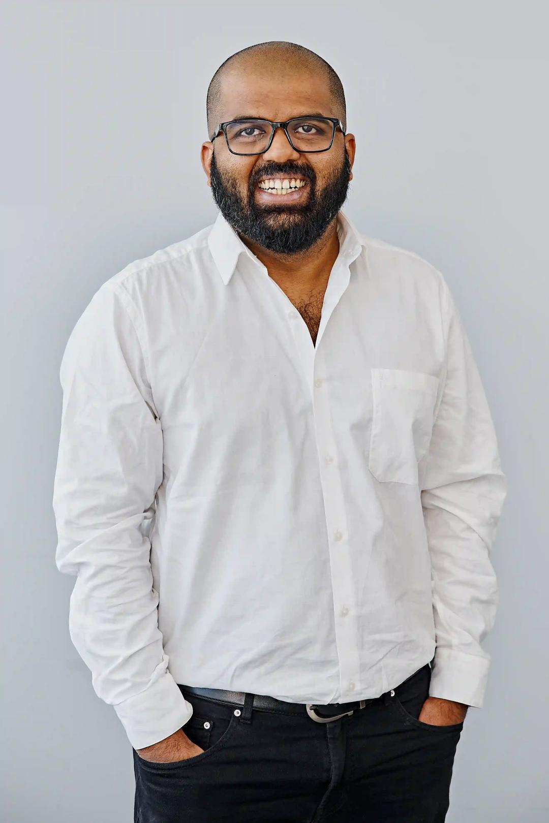Headshot of Nitin Karunakaran, SEO Implementations Director