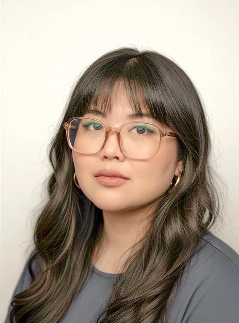 Headshot of Michaela Calma, Analytics Manager