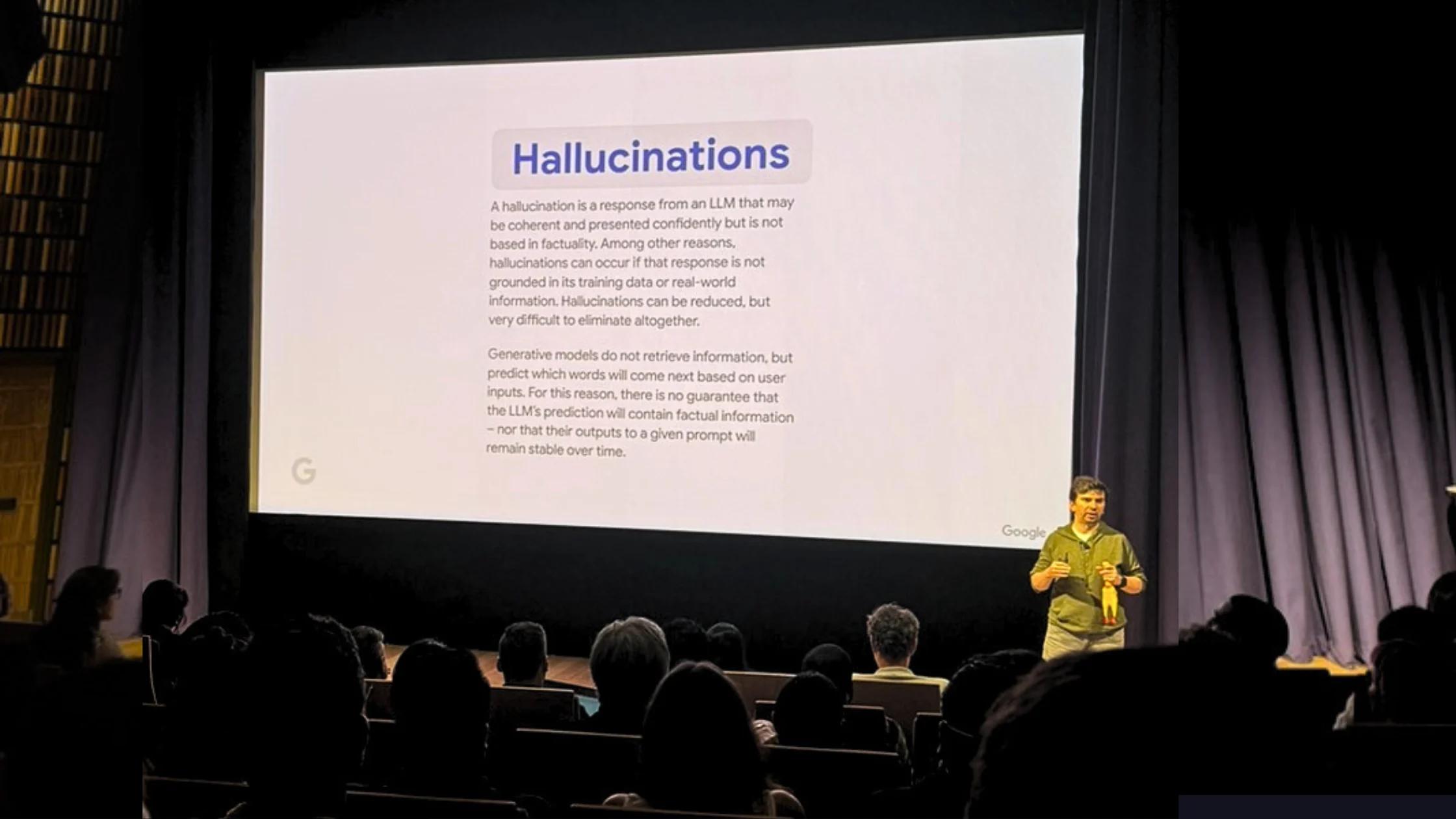 Photo of stage, speaker and screen at Google's Search Central Live event in Sydney.
