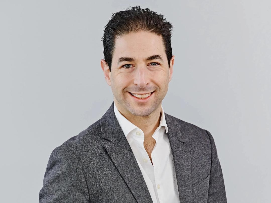 Headshot of Justin Grossbard, MD of Owned & Earned Media