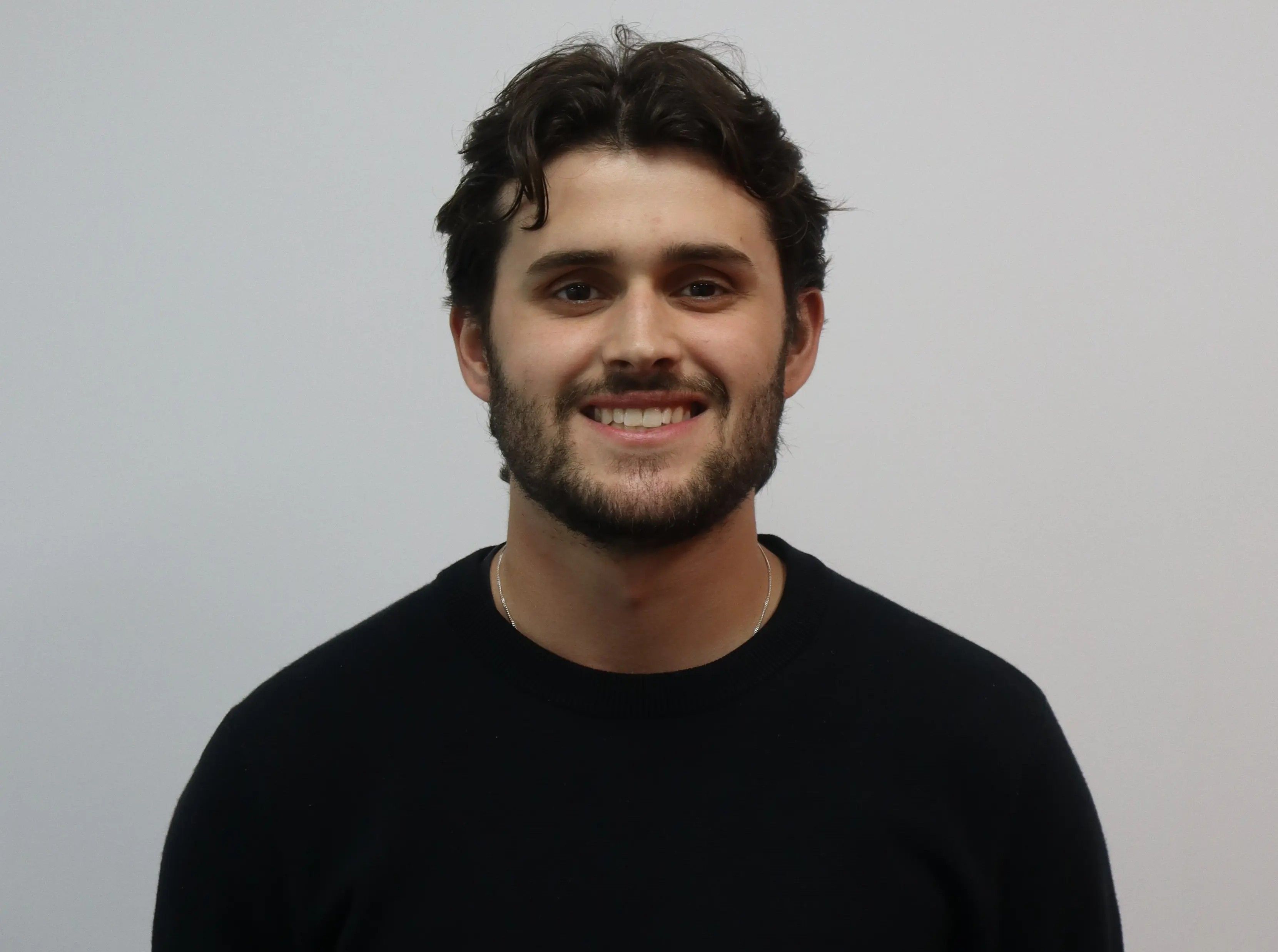 Headshot of Aidan Peck, Performance Specialist