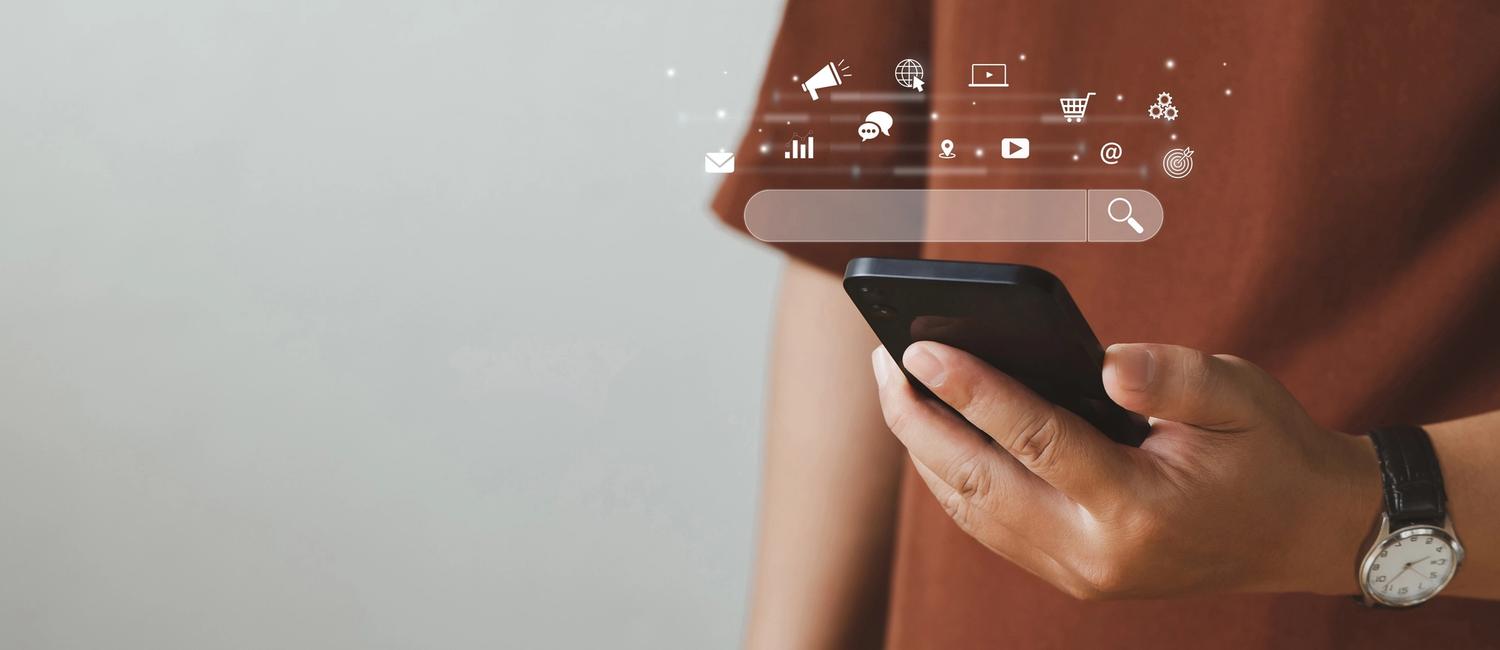 Man with watch using smartphone with SEO icons and google search bar to generate organic traffic.