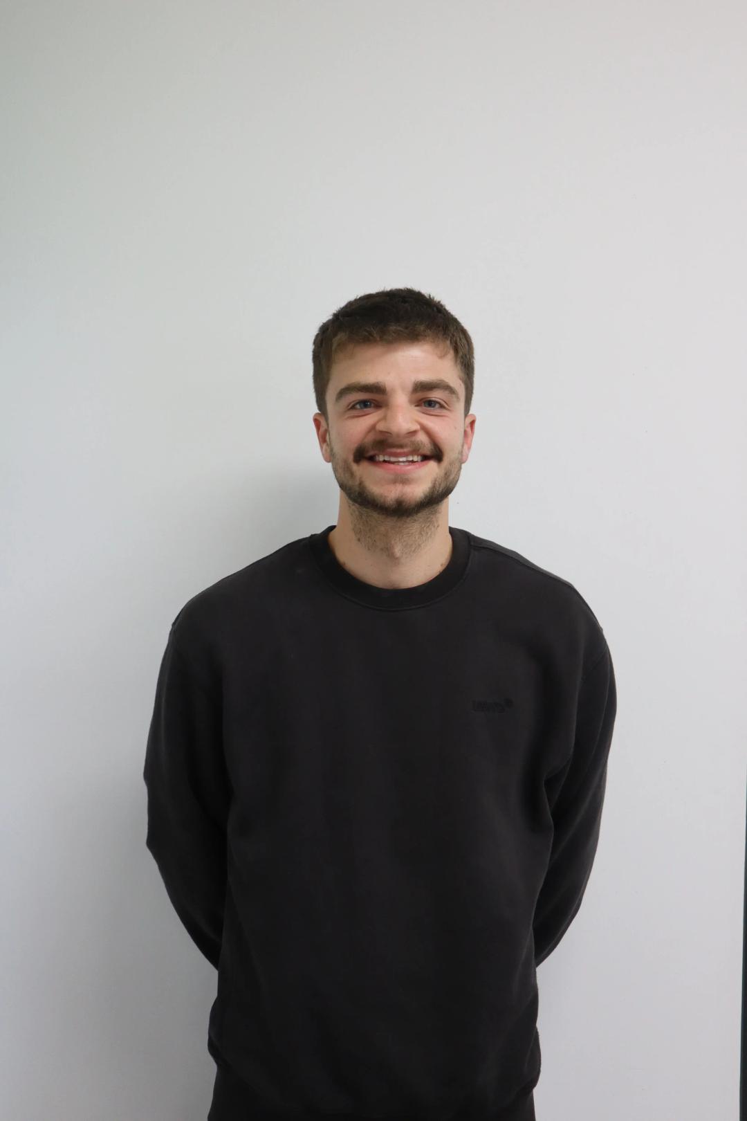 Headshot of Kane Pirera, SEO Manager