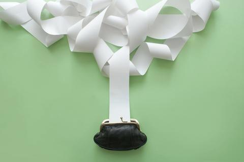 Purse with overflowing receipt