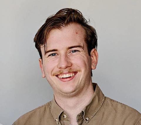 Headshot of Thomas Nicholson, Experience Manager