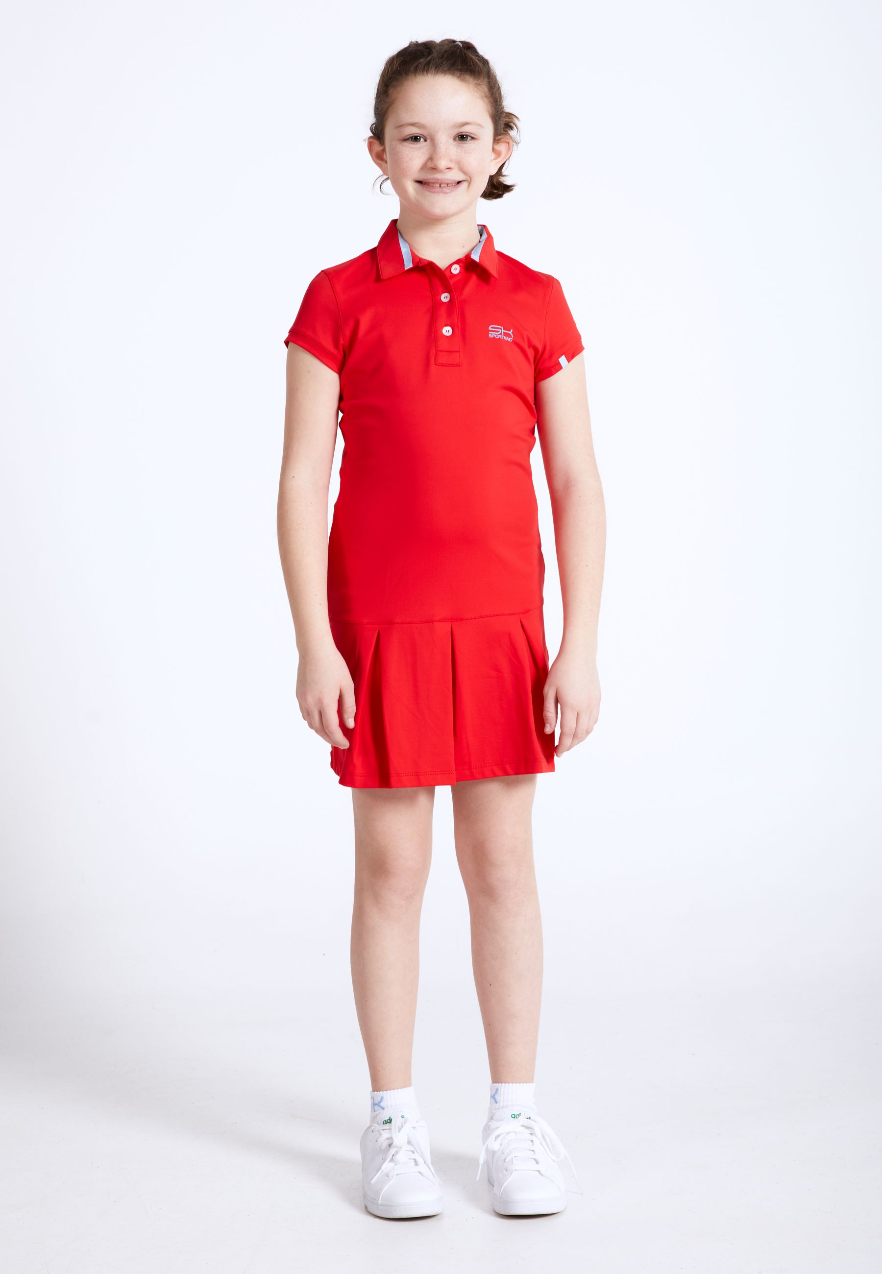 Fille en robe polo de tennis de SPORTKIND