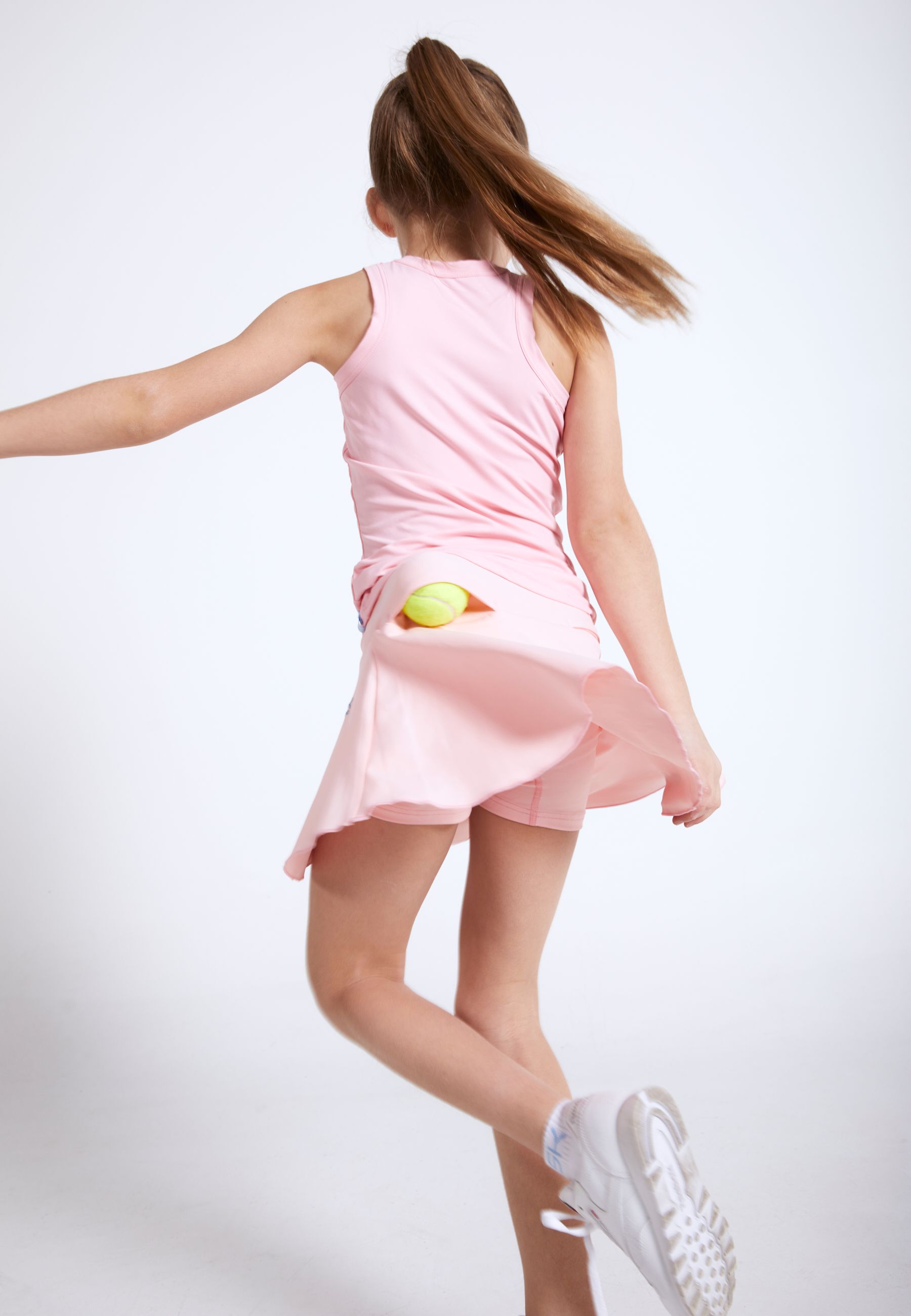 Fille avec jupe de tennis Advantage de SPORTKIND.