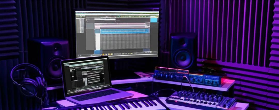  Home music studio setup with laptop, MIDI keyboard, and audio interface for freelance music production